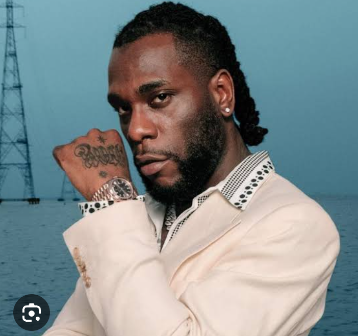 “I Don Pay Their School Fees!” — Burna Boy Reacts as Excited Fans Swarm His McLaren Senna in Lagos Streets