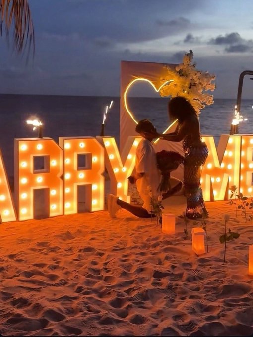 Davido’s Official DJ, Ecool, Melts Hearts as He Proposes to His Girlfriend in a Romantic Surprise