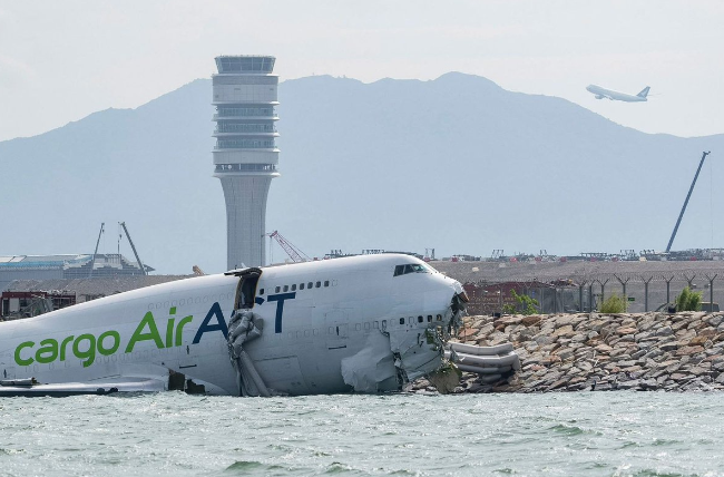 Horror at 30,000 Feet: Cargo Plane Crashes into Sea at Hong Kong Airport, Killing Two Ground Staff in Tragic Dawn Disaster
