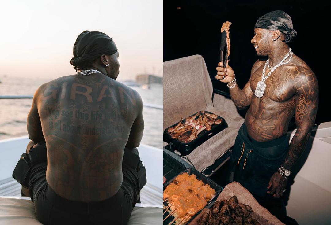 Asake Unveils Stunning Full-Body Tattoos in Daring New Photos